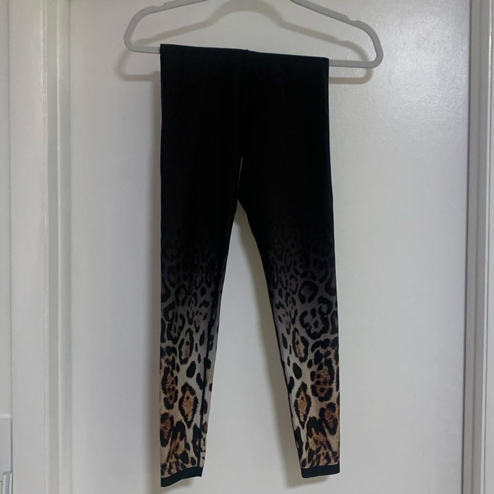 Ultracor Black and Leopard Print leggings. Sz XS. Like New condition